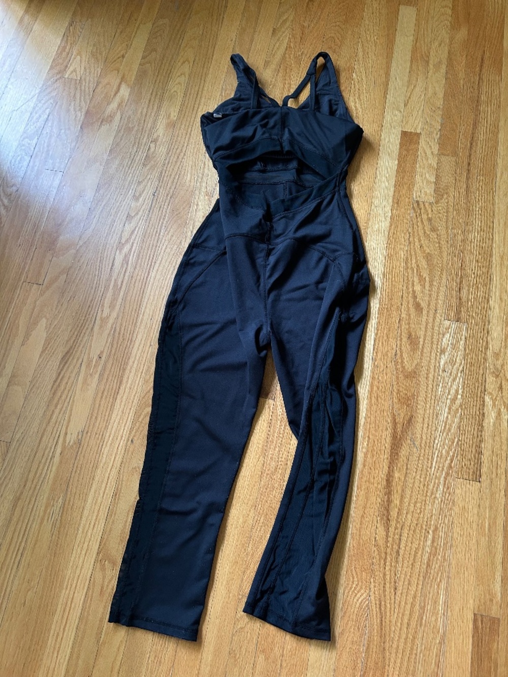 Really cute athletic jumpsuit with great back strap detail